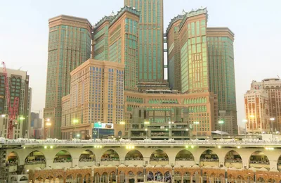 The Kaaba with Makkah Clock Tower behind, Makkah — umrah packages uk